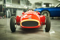 Load image into Gallery viewer, Heritage Racer D50 kids' electric ride-on F1 car — dramatic low front view