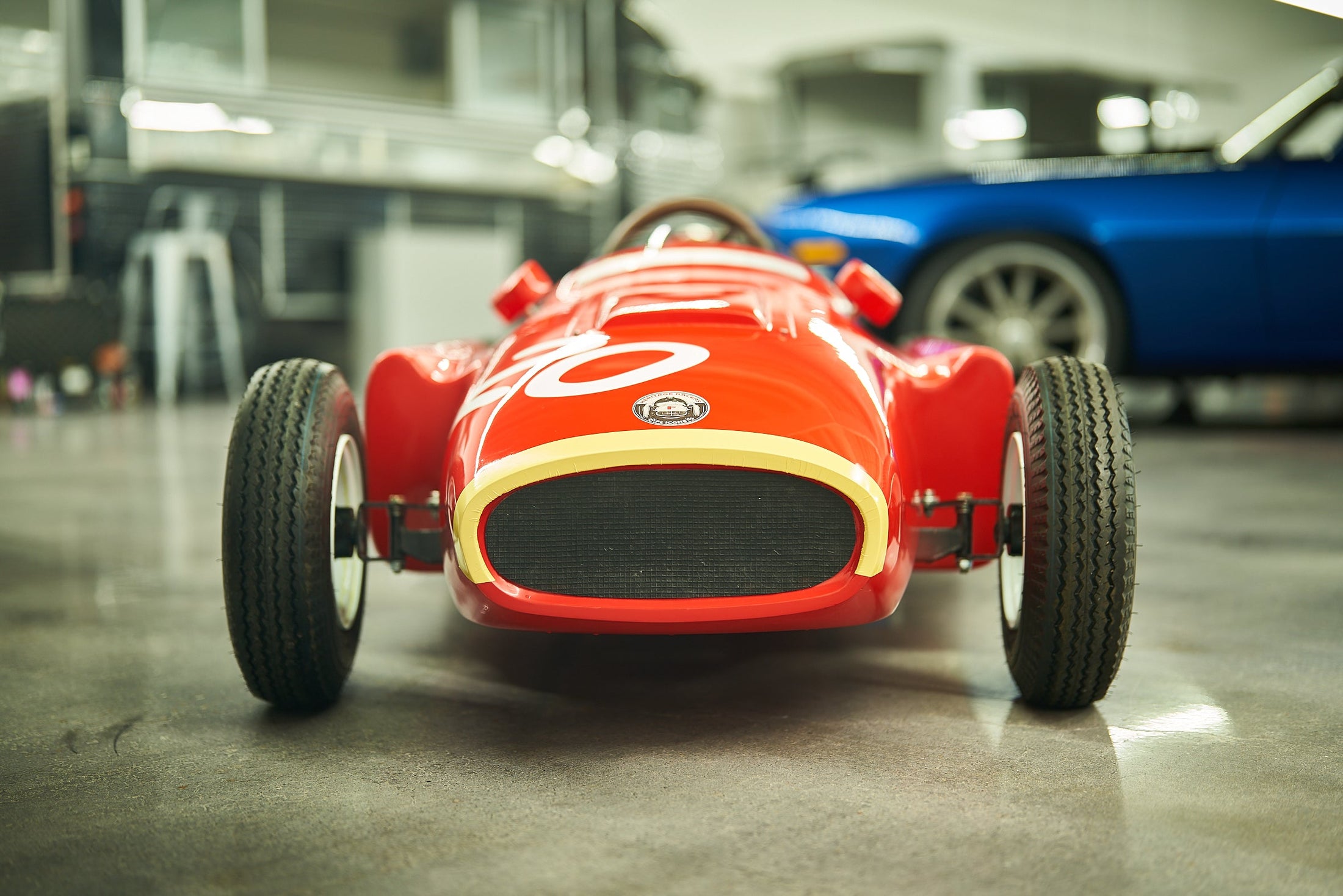 Heritage Racer D50 kids' electric ride-on F1 car — dramatic low front view
